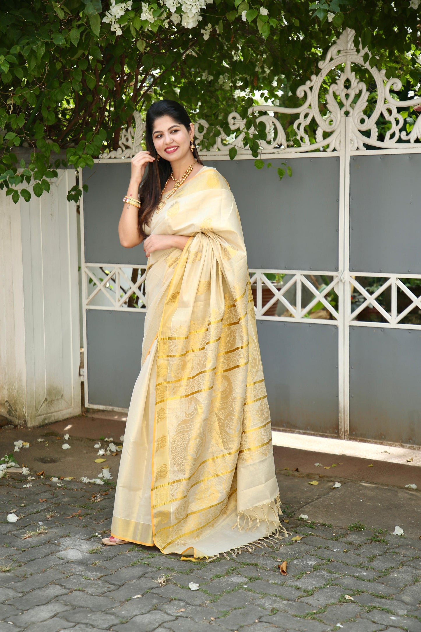 Rich Pallu Handloom replica golden tissue saree with tussels