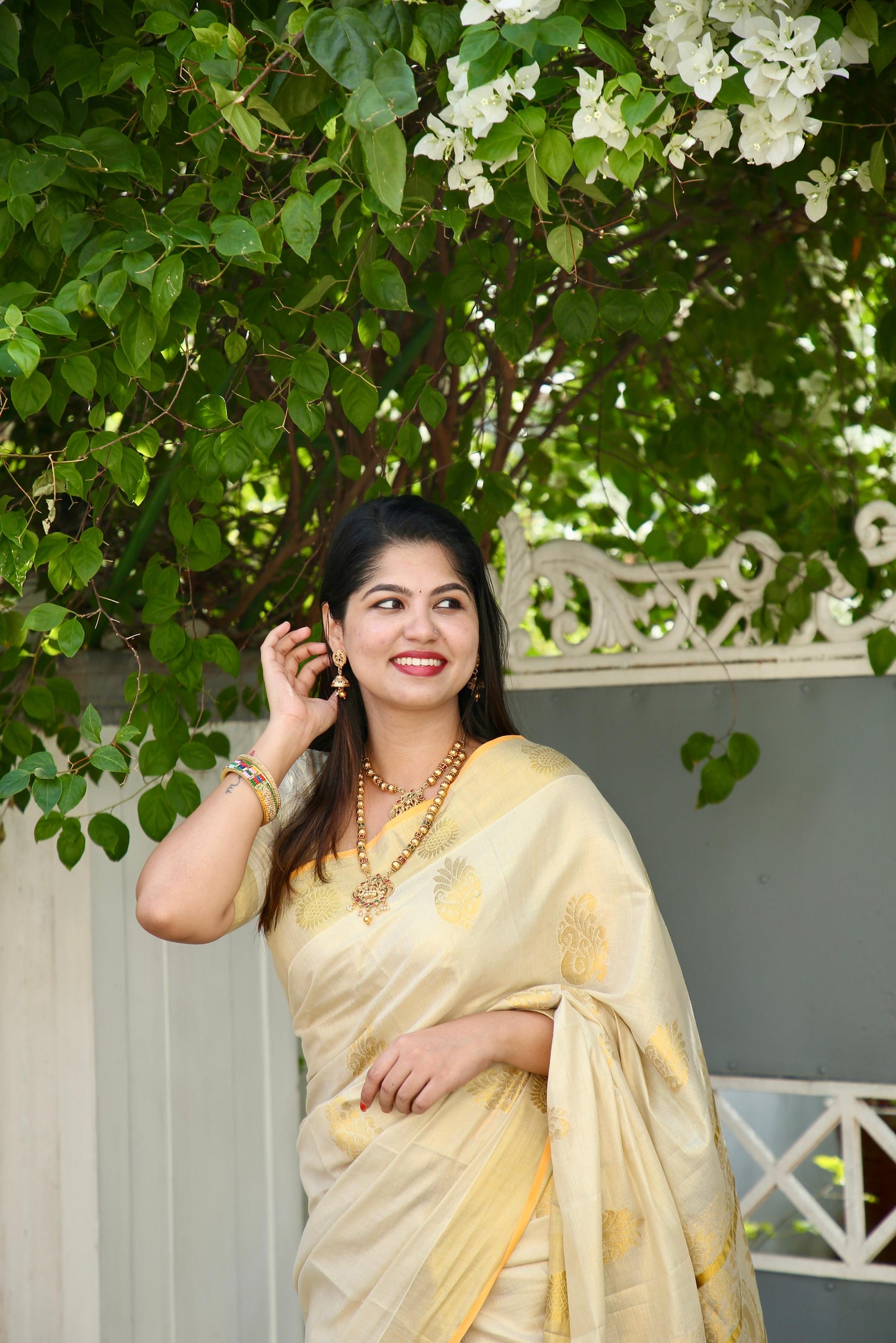 Rich Pallu Handloom replica golden tissue saree with tussels